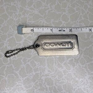 Coach Silver-Tone Bag Tag